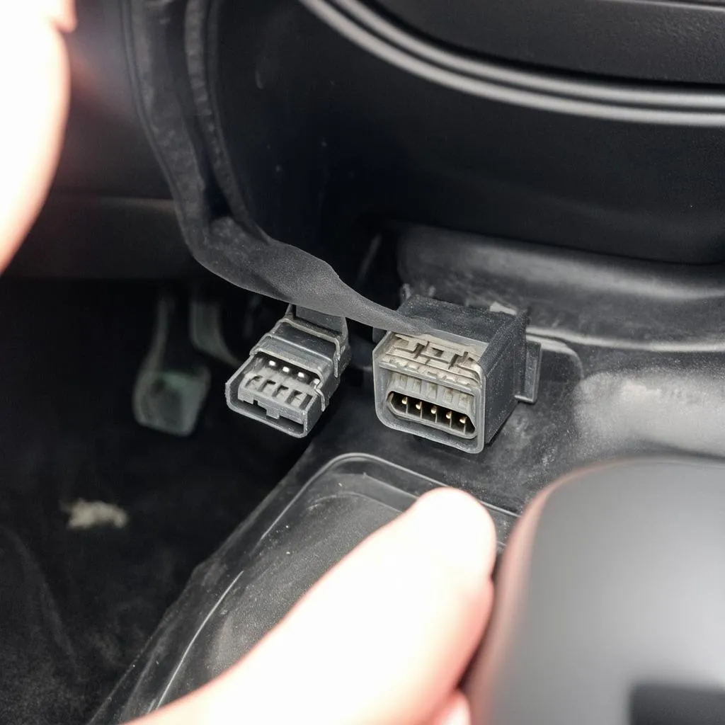 OBD connector location in a 2001 Grand Am