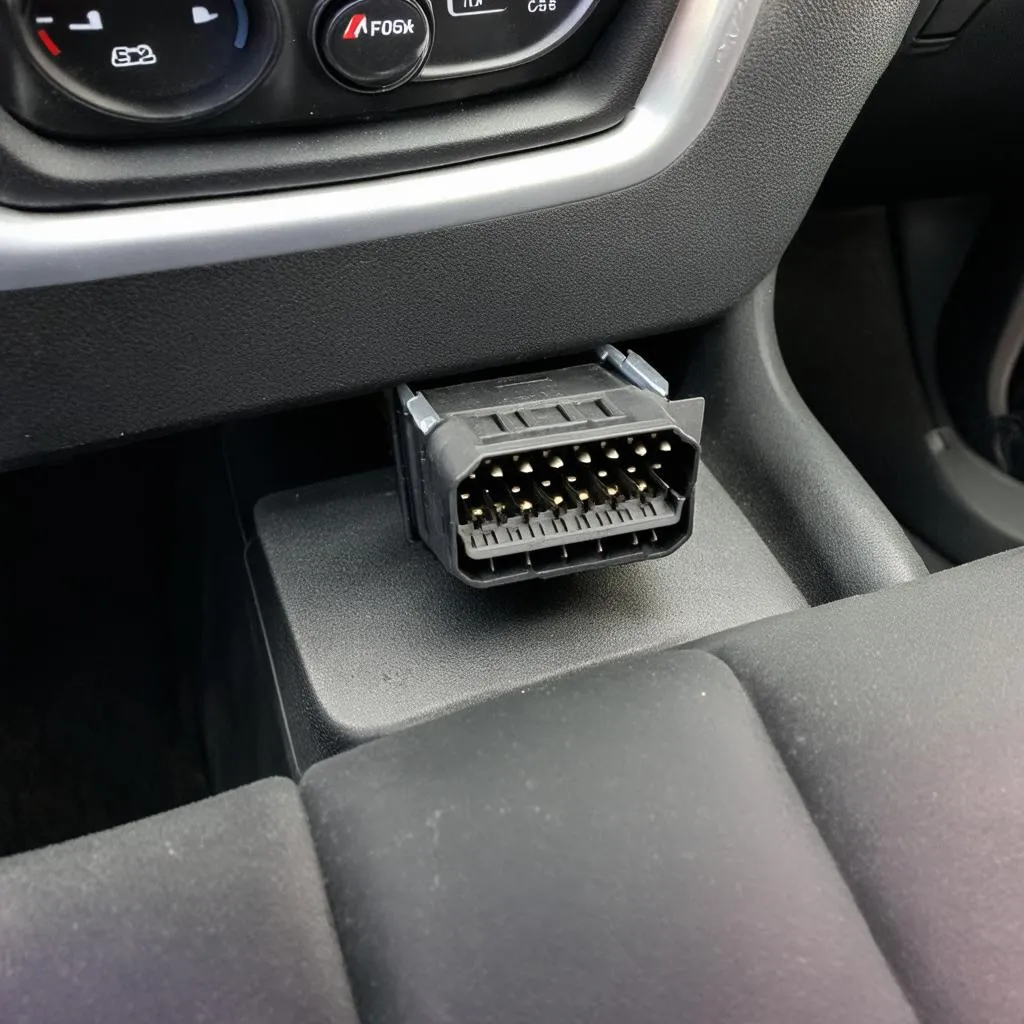 OBD2 Port Location in 2003 Ford Focus