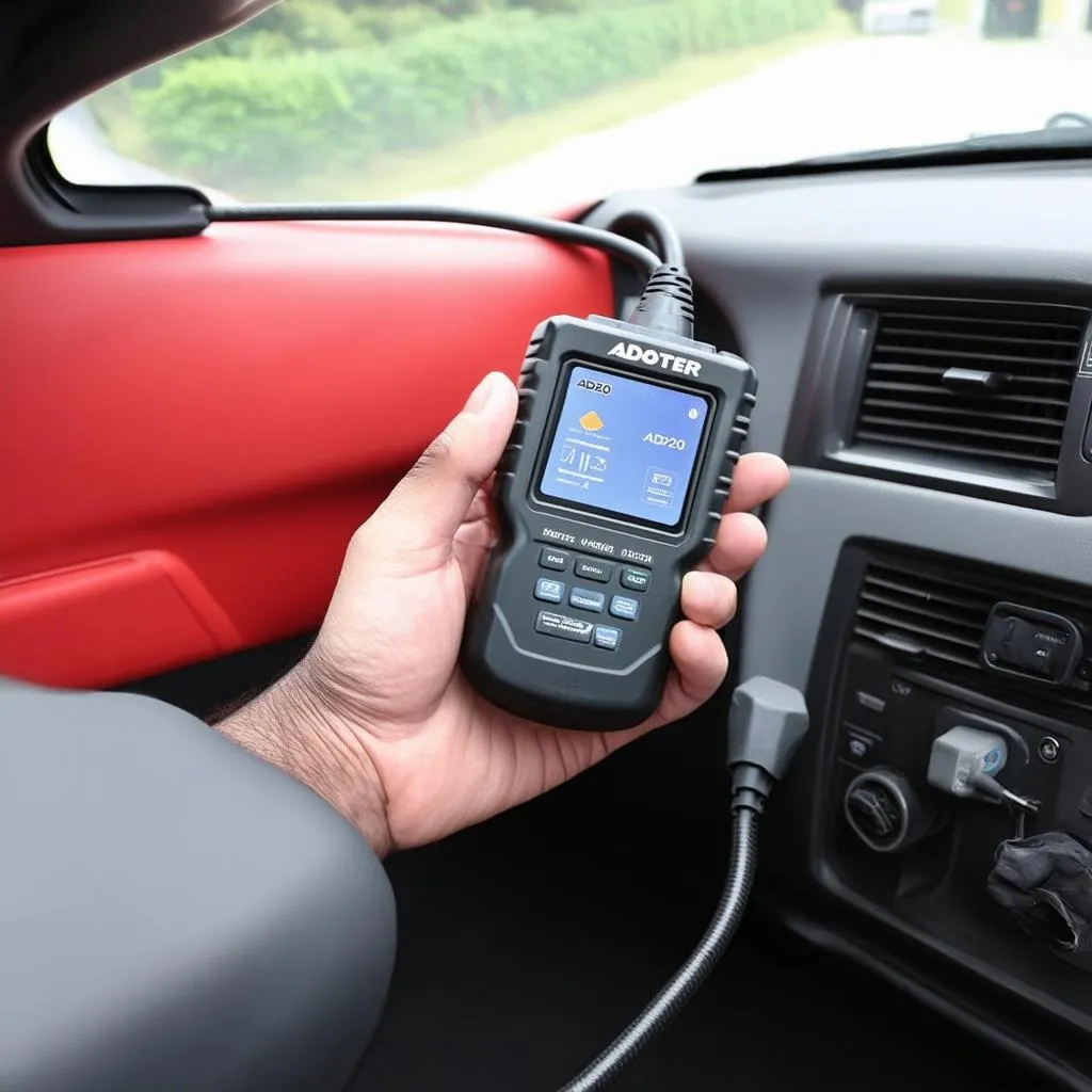 Unveiling the Power of the ADOTER AD200 OBD2 Scanner: Your Key to Automotive Diagnostics