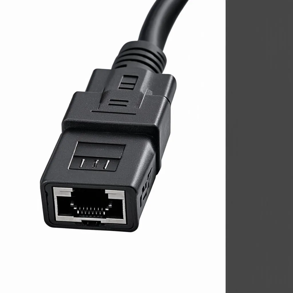 Close-up shot of an Ethernet to OBD cable, showcasing the connector and details