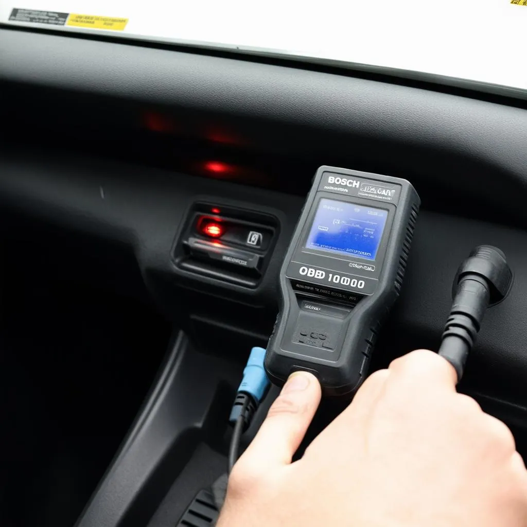 Bosch PocketScan OBD1000 connected to a car's OBD-II port