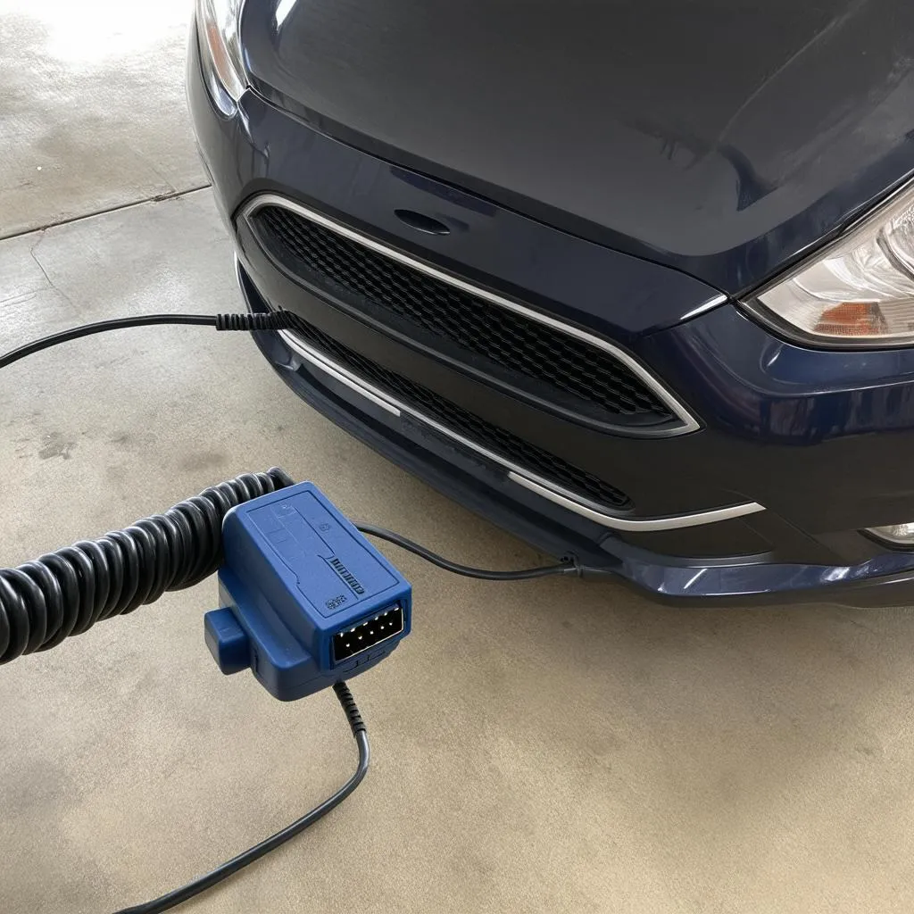 OBD2 scanner connected to a 2009 Ford Fiesta