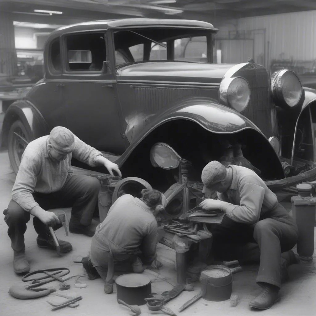 A mechanic working on a car in a 1930s garage