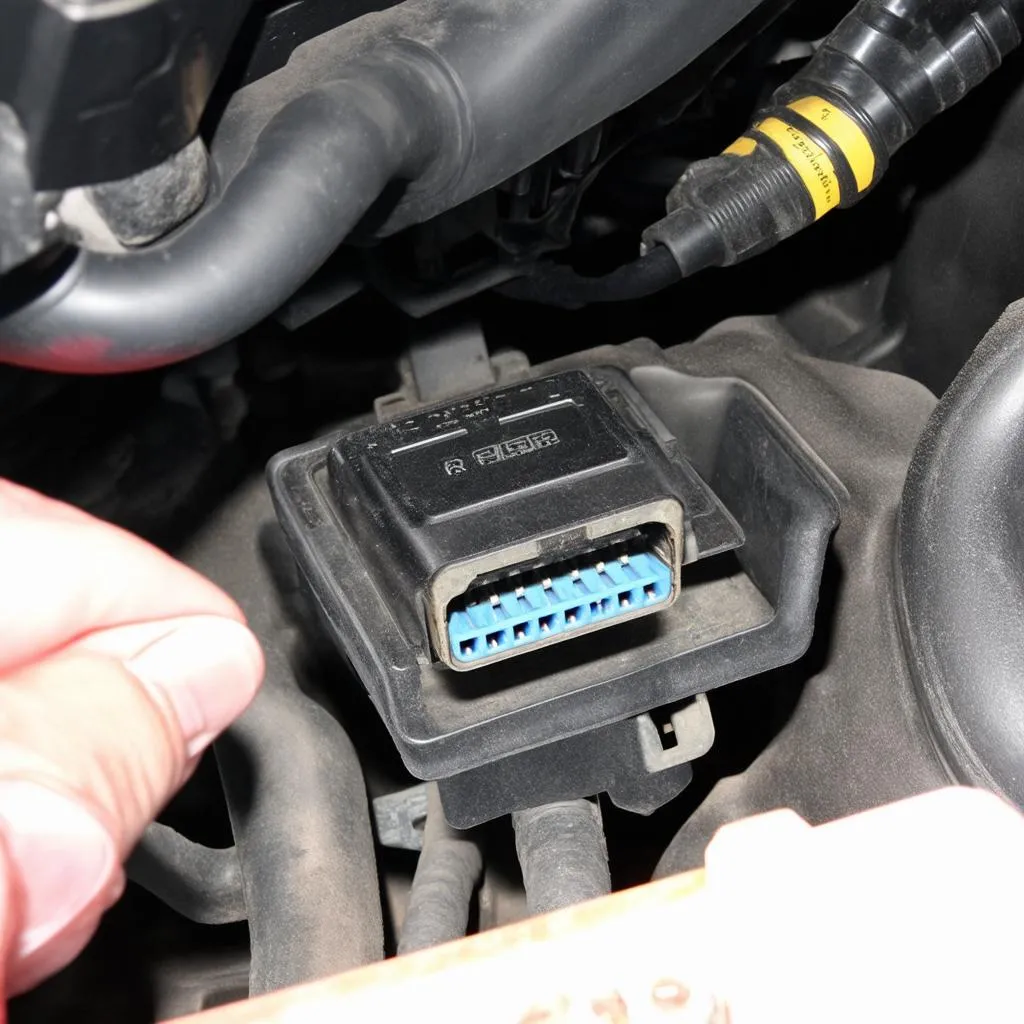 2003 ford ranger obd port location