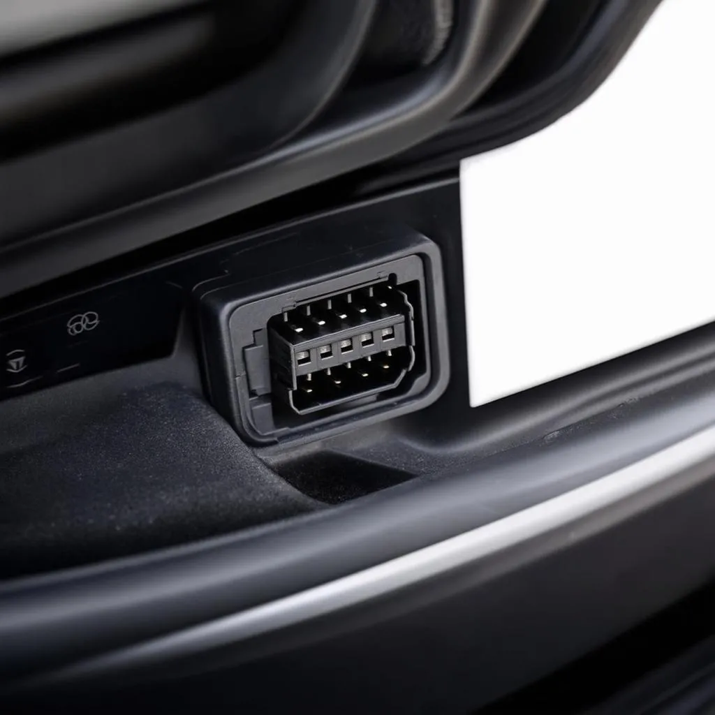 Where is the OBD Port Located on a 2018 Audi Q7?