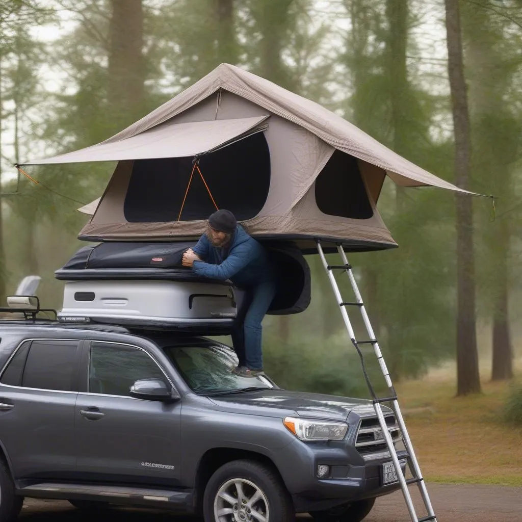 Setting up a roof tent on a car