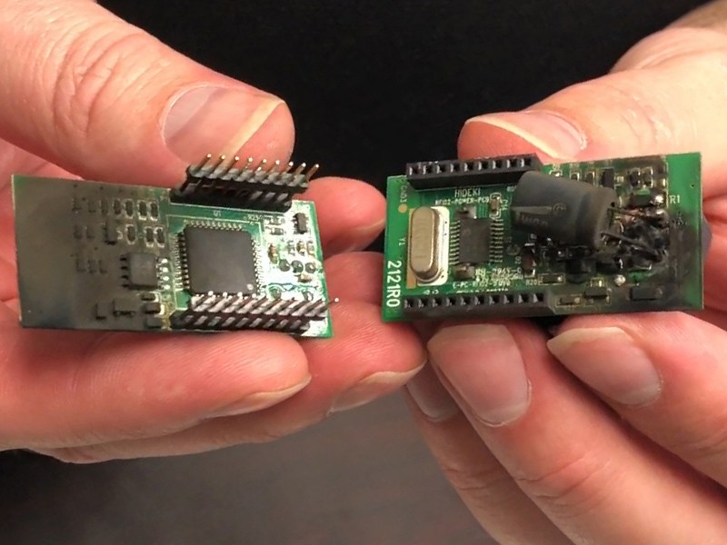 Image showing a burned and damaged BlueDriver OBD2 adapter after overvoltage testing, highlighting the lack of robust protection against electrical surges.