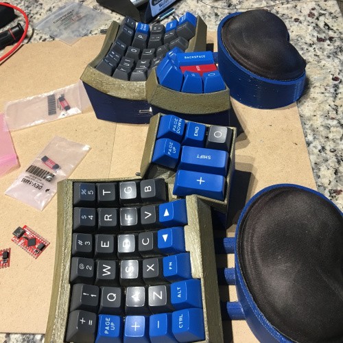 Close-up of a custom-built Dactyl keyboard, showcasing its ergonomic split design.