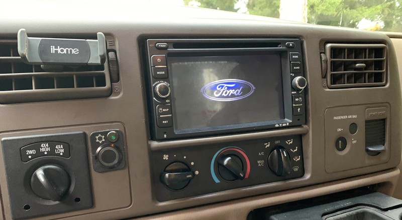 Aftermarket double din radio installed in a 2006 Ford F150 dashboard, showcasing the integrated look.