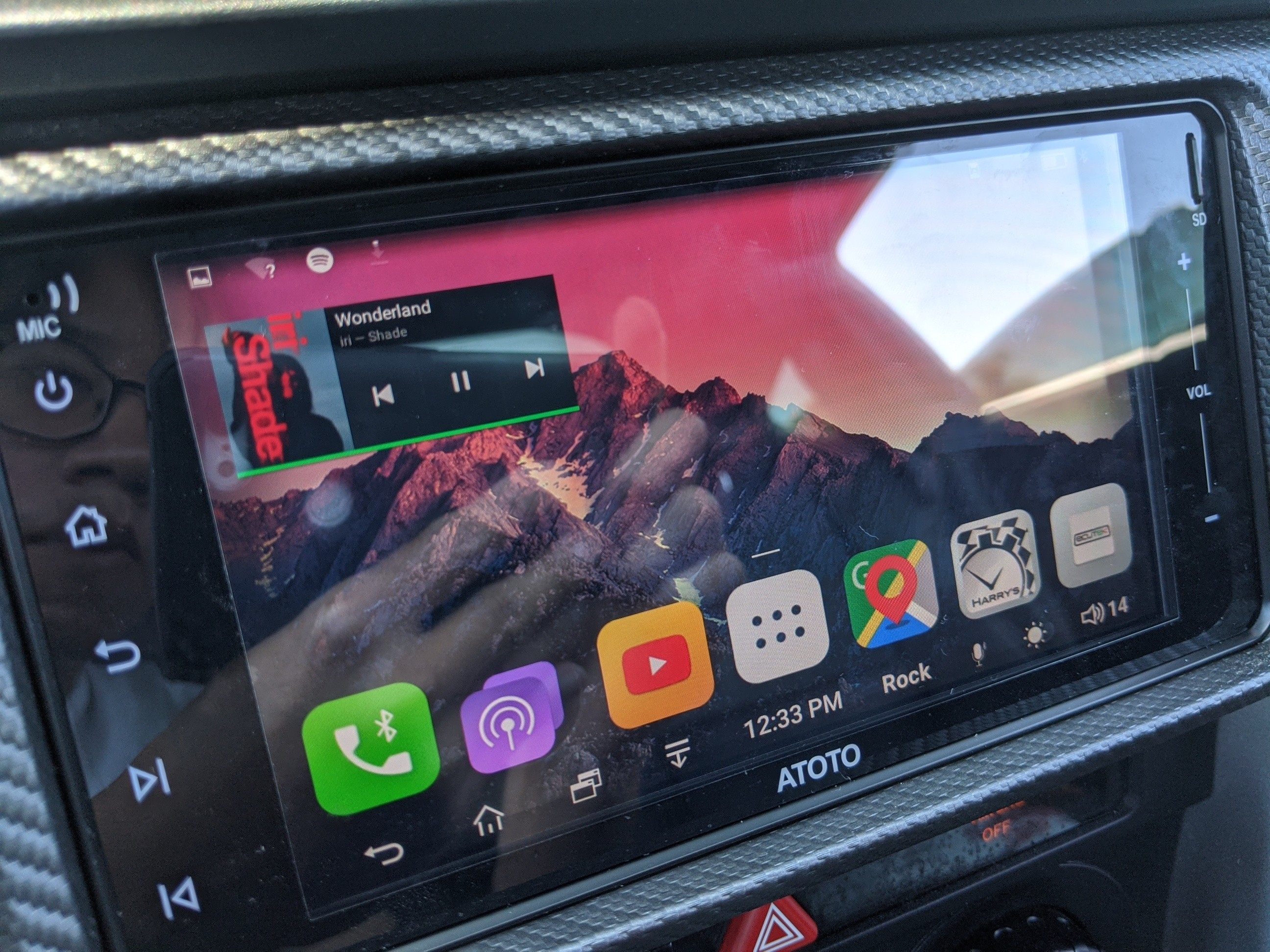 Atoto A6 head unit installed in a car dashboard, showcasing OEM-like fit